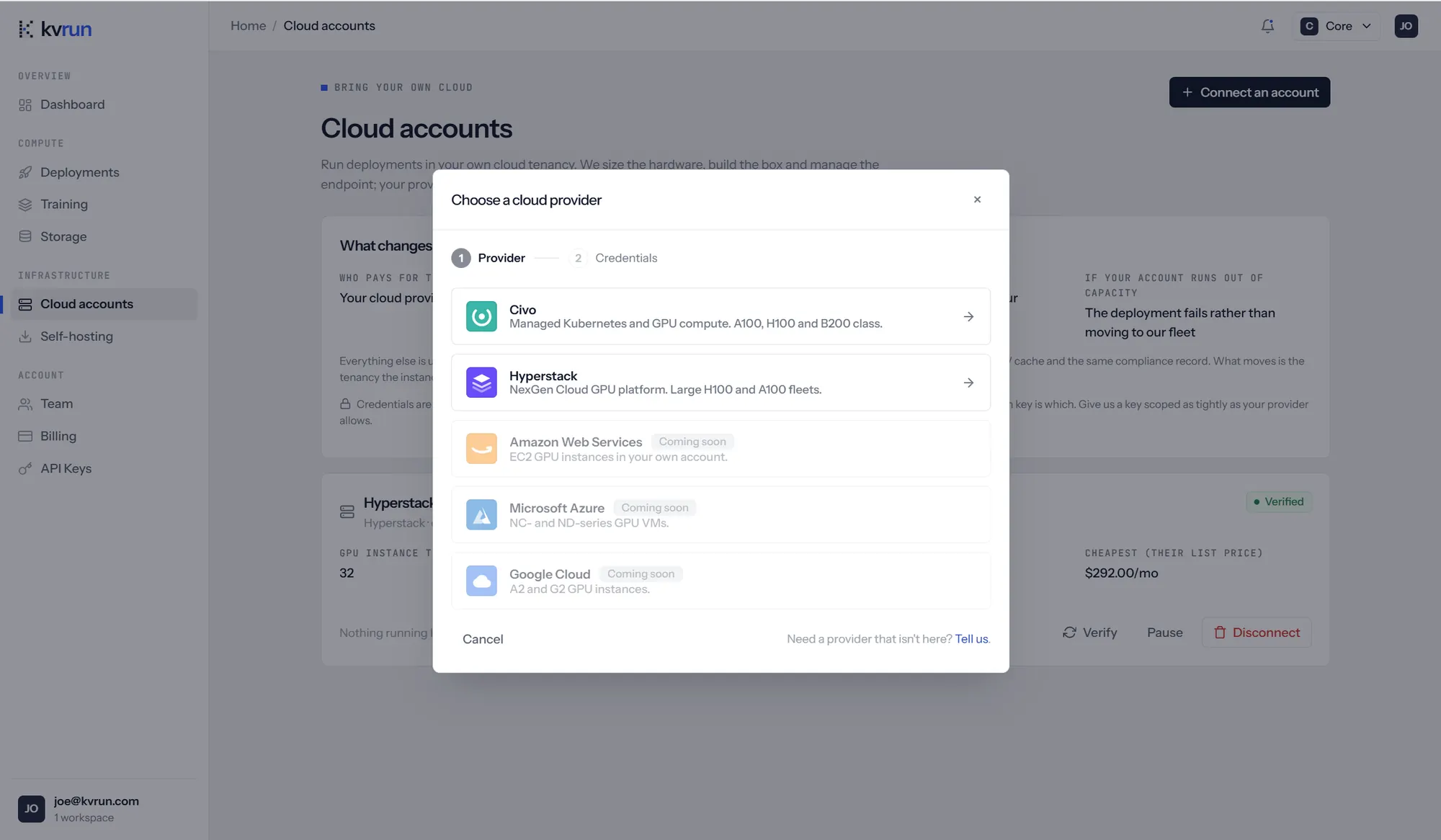 The Cloud accounts page with a Choose a cloud provider dialog open on step 1 of 2, Provider, before Credentials. Civo is offered as managed Kubernetes and GPU compute in the A100, H100 and B200 class, and Hyperstack as the NexGen Cloud GPU platform with large H100 and A100 fleets. Amazon Web Services, Microsoft Azure and Google Cloud are listed below, greyed out and marked Coming soon. Behind the dialog, an already connected and verified Hyperstack account shows its GPU instance types and cheapest list price, and the page states that a deployment fails rather than moving to our fleet if the account runs out of capacity.
